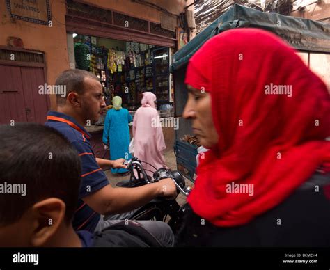 Abdessalam Bouazizi (36), in red, a cousin of Mohamed Bouazizi's who used to work with him at the market, said he and other street vendors still get harassed by the police, who also confiscate ...